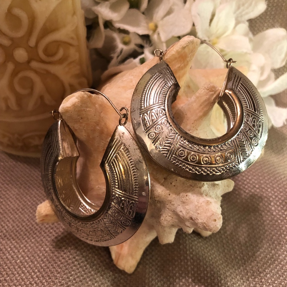 Silver tone “tribal” earrings